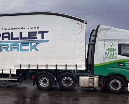 M&H Carriers' new dual-livery double-deck trailer showcasing growth within the Pallet-Track network