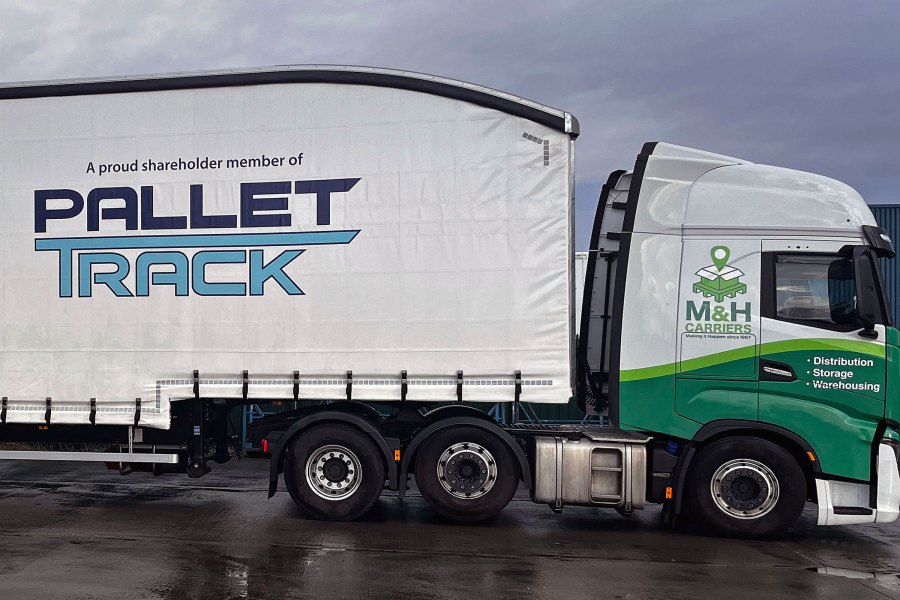 M&H Carriers' new dual-livery double-deck trailer showcasing growth within the Pallet-Track network